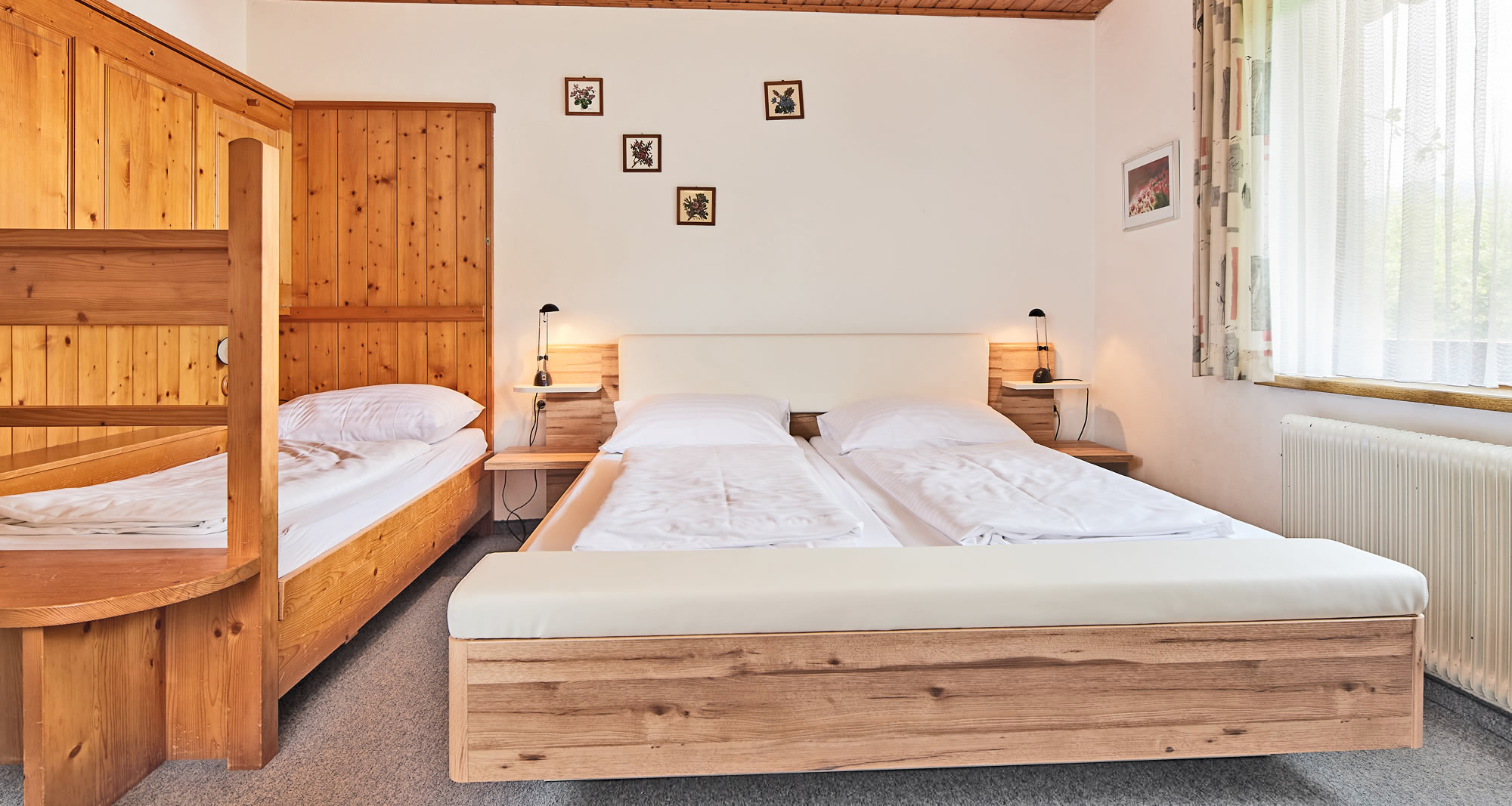 Schlafzimmer Appartement Seeblick am Abenteuerhof